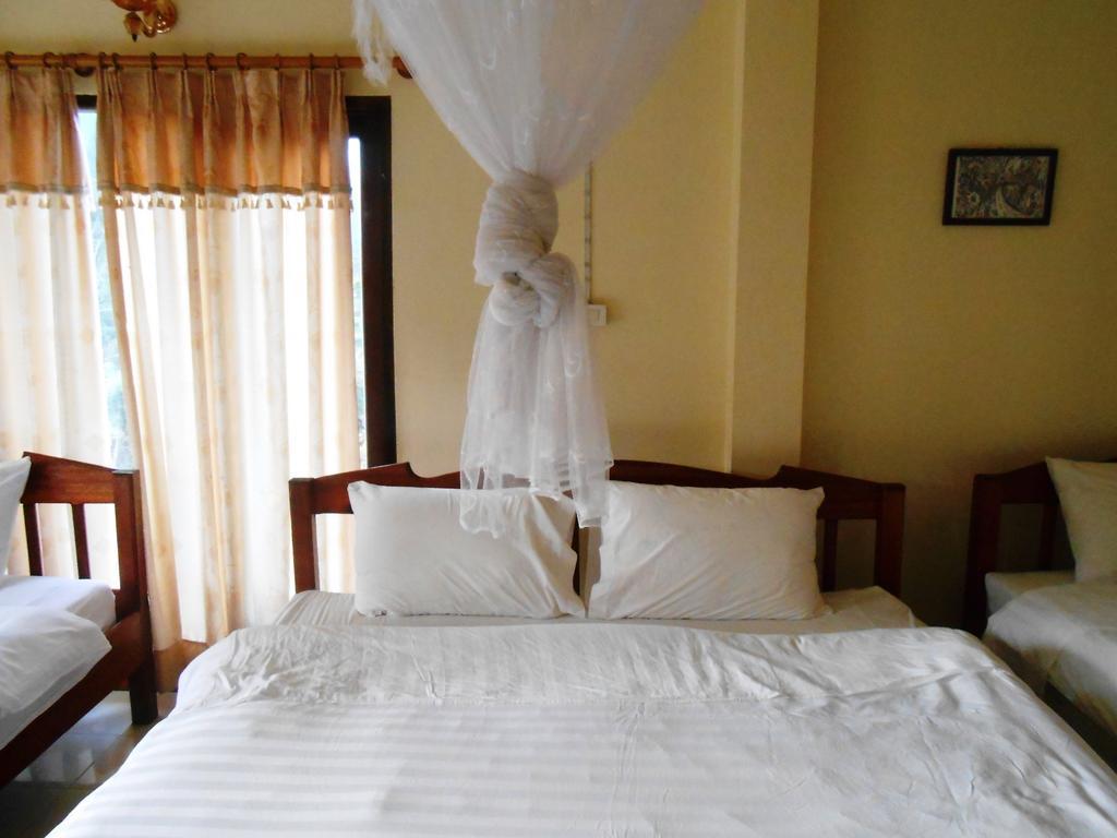 Jammee Guesthouse Ванг-Виенг Номер фото