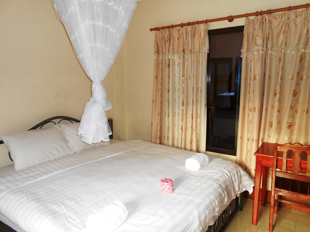 Jammee Guesthouse Ванг-Виенг Номер фото